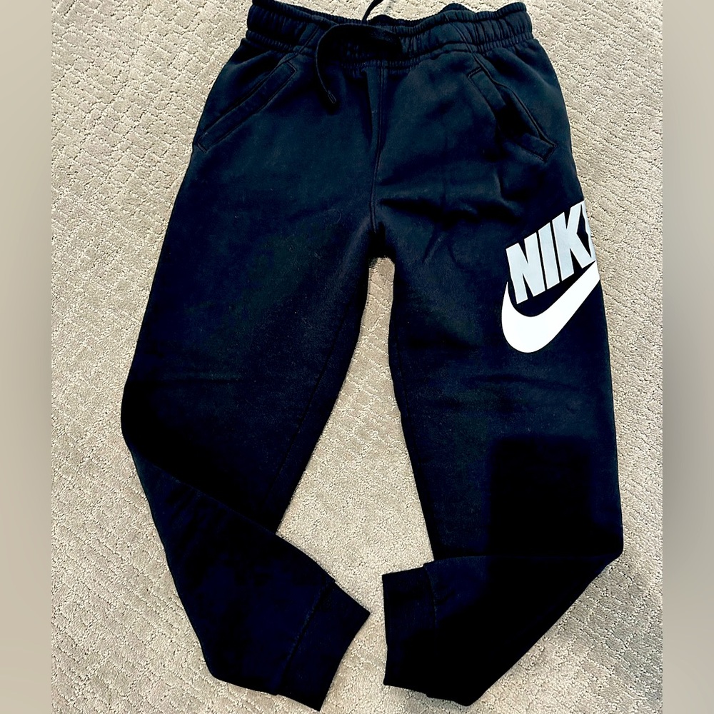 Nike black sweatpants. Drawstring waist size medium. Like new